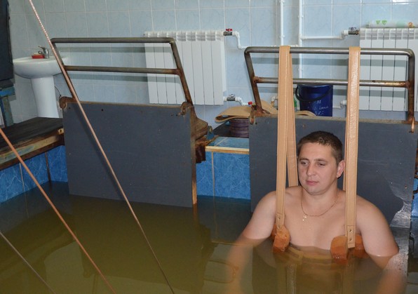 вертикальне витягування у радоновій воді